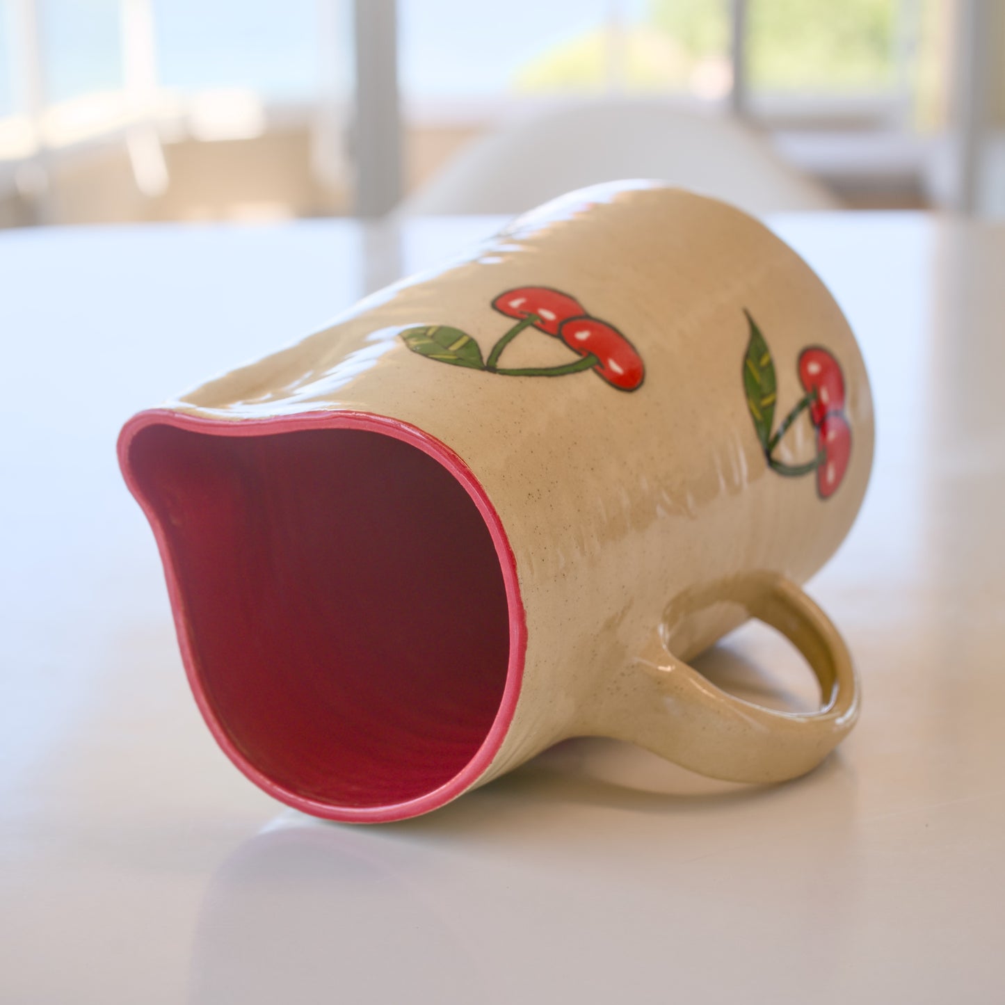 The Homestead Cherry Pitcher